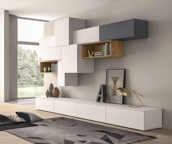 Мебель для гостиной должна быть стильной и функциональной. Как обставить зал в стандартной квартире Какой набор будет наиболее актуален и какие материалы выбрать для основы и обивки