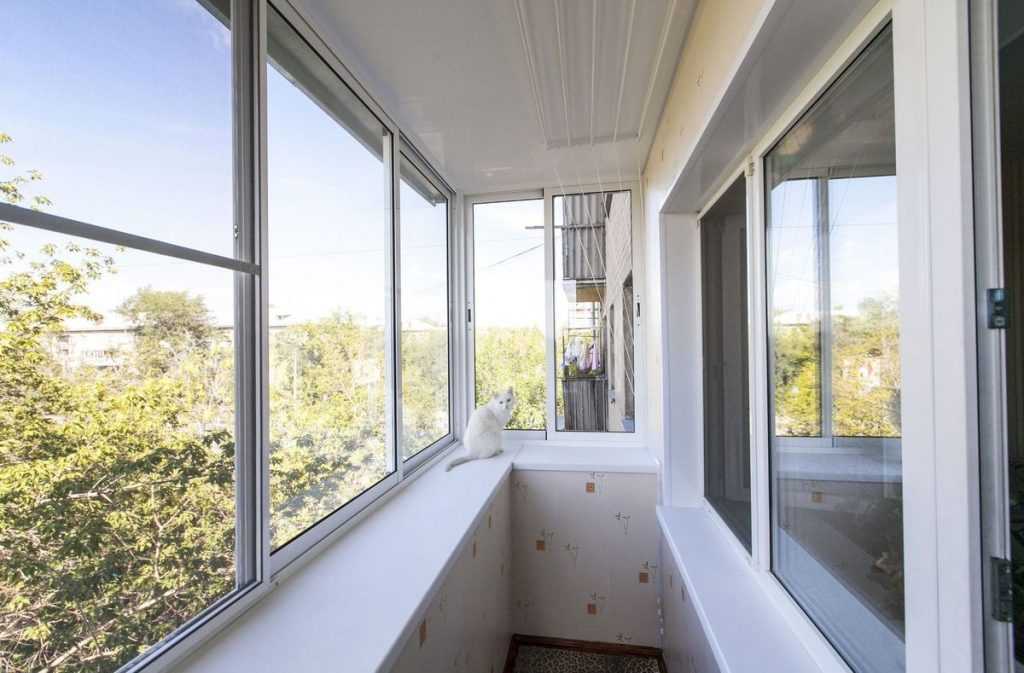Безрамное остекление балконов (50 фото): отзывы о теплых стеклопакетах