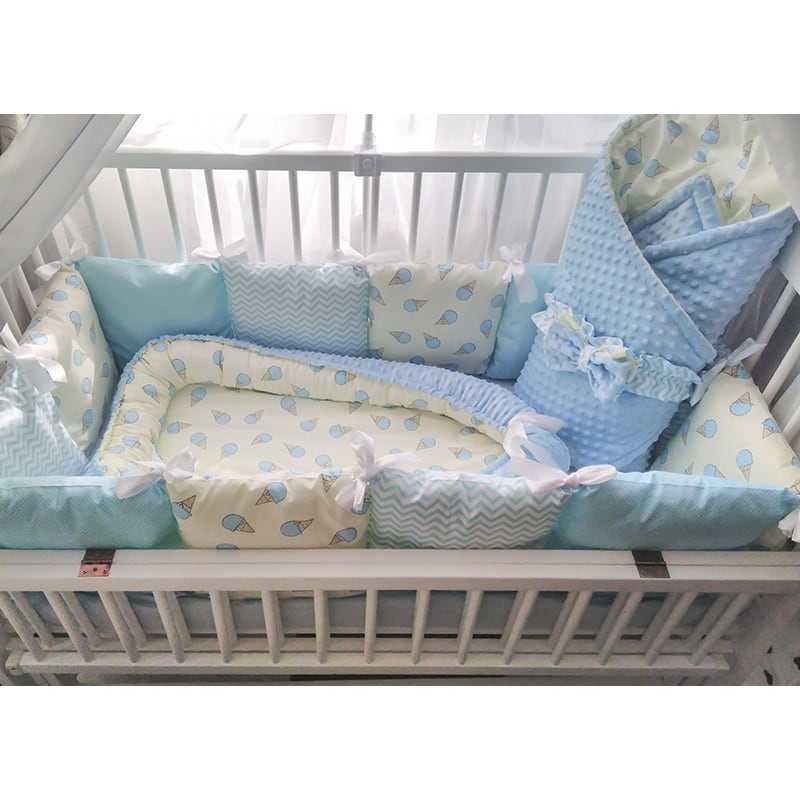 Разновидности бортиков в круглую и овальную кроватку для новорожденных