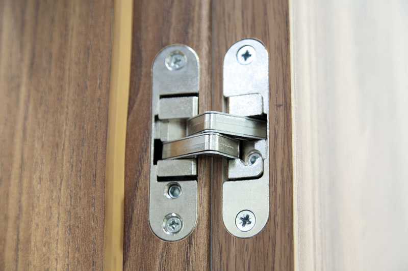 Скрытые внутренние петли для металлических дверей: выбор и установка