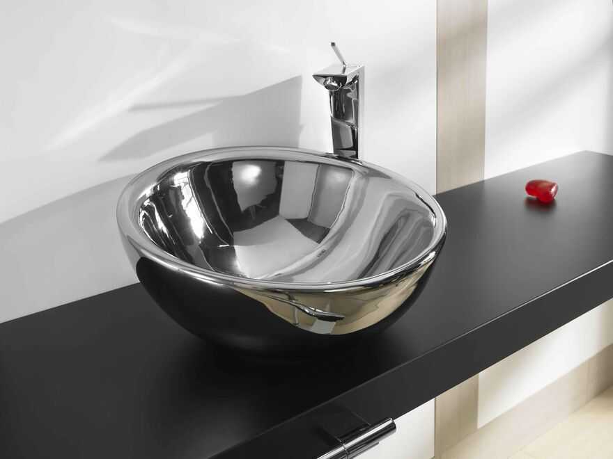 Черная раковина: умывальник темного цвета в ванной комнате, мойка из черно-белого керамогранита на кухне, отзывы владельцев