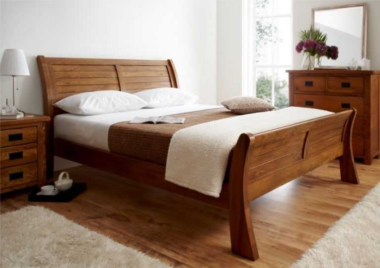 Кровати из натурального дерева, массива сосны, дуба, бука - особенности, плюсы и минусы