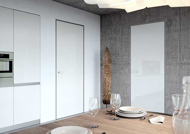 Скрытые двери: разновидности, комплектующие, особенности установки и эксплуатации, а также варианты использования в интерьере помещения