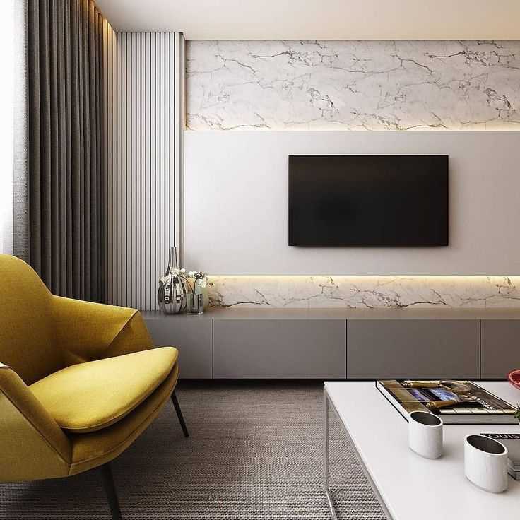 Телевизор на стене в интерьере (46 фото): оформление стены ламинатом и другими материалами в гостиной. дизайн подвески и декоративная отделка в спальне