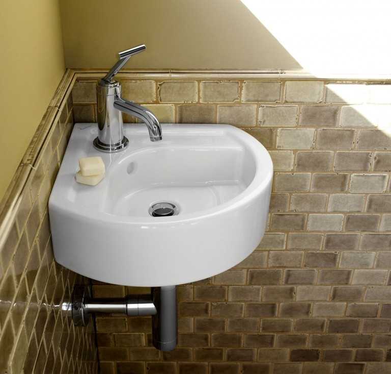 Угловые раковины станут идеальным решением для малогабаритных ванных комнат. Какие бывают виды В чем преимущества угловых раковин Как подобрать маленький умывальник в ванную комнату