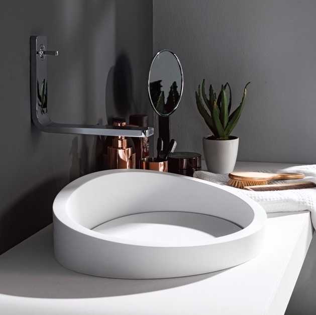 Черная раковина является главным атрибутом в дизайне современного интерьера. Как подобрать умывальник темного цвета в ванной комнате Почему популярна мойка из черно-белого керамогранита на кухне